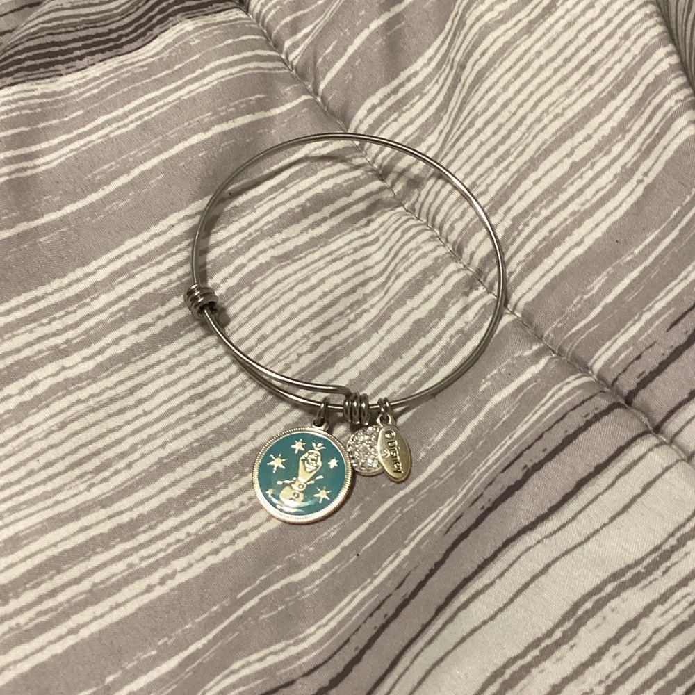 Chic Silver Bangle with Gold Charms